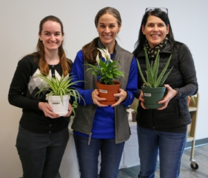 Elizabethtown Librarians posing with plants.